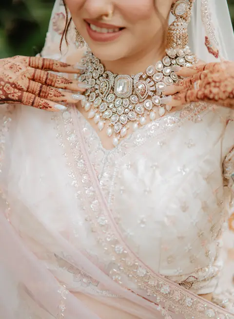 Close-up of a bride's mehendi and jewellery